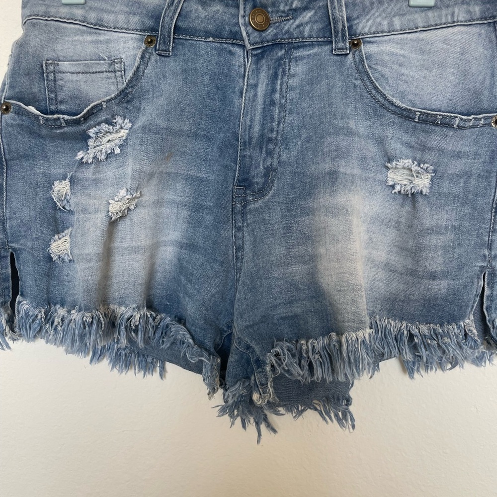 Ripped blue jean shorts teen size L